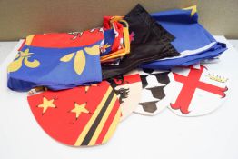 A box of assorted Heraldic standards/flags/shields etc