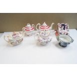 A collection of 19th century and later teapots,