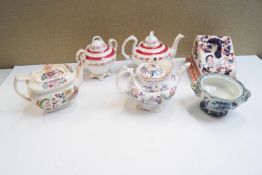 A collection of 19th century and later teapots,