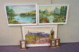 An oil painting of Arizona and other framed items