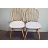 A pair of hoop back chairs