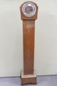 A grandmother clock in mahogany,
