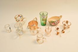 A Mary Gregory type glass mug and other decorated glass items