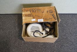 A boxed period Bakelite Supreme hair dryer