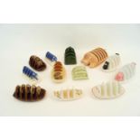 A group of assorted pottery toast racks