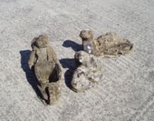 A group of composite stone garden figures,