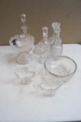 A group of decanters and other items