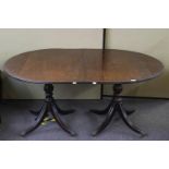 A mahogany twin pedestal dining table,