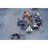 Four petrol strimmers,