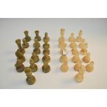 A turned variegated onyx chess set
