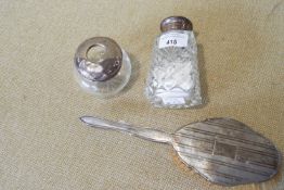 A silver brush,
