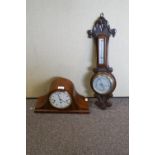 A Comitti mahogany cased mantel clock and an oak cased barometer