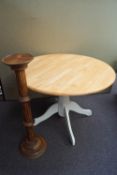 A pine table and a torchere 75cm high
