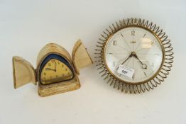 A cased Deco clock and an eight day clock