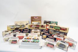 A group of boxed model cars