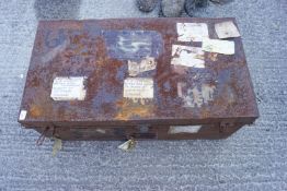 A tin trunk and enamel ware