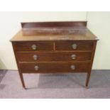 A mahogany chest of drawers,