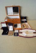 A quantity of costume jewellery in a wooden jewellery box