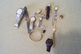 A group of watches and an RAF brooch