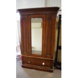 A Victorian mahogany wardrobe with mirror door,