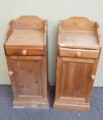 A pair of pine bedside cupboards,