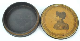 A 19th century circular snuff box, the top with an image of Napoleon,