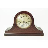 An Edwardian helmet form mantel clock,