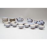 A Russian porcelain tea service,m comprising two tea pots and covers, two sucrieres and covers,