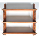 A 19th century mahogany hanging three tier wall shelf with tapered uprights,