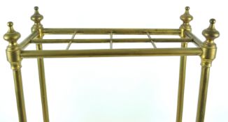 A brass and cast iron stick stand, of rectangular form,