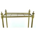 A brass and cast iron stick stand, of rectangular form,