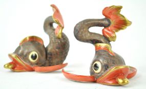 A pair of Herend dolphin menu holders,