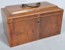 A George III mahogany rectangular section tea caddy with ebony and satinwood banding,