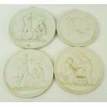 A set of three Royal Copenhagen Parian round wall plaques, factory marks and impressed marks,