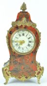 An Edwardian French style mantel clock with gilt metal mounted boulle front,