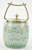 A Victorian glass biscuit barrel with silver plated mounts,