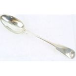 A Newcastle silver stuffing spoon, in the fiddle and shell pattern with shell picture back,