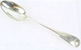 A Newcastle silver stuffing spoon, in the fiddle and shell pattern with shell picture back,