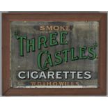 An advertising mirror, 'Smoke Three Castles Cigarettes', WD & HO Wills, 22cm x 29.