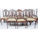 A set of six plus two Edwardian mahogany dining chairs with shield shaped backs (8) 103cm high x