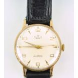 A Smiths deluxe wristwatch with black leather strap. Hallmarked 9ct gold case.