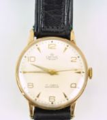 A Smiths deluxe wristwatch with black leather strap. Hallmarked 9ct gold case.