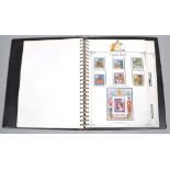 A 25th Anniversary of Coronation UMM stamp Lyndhurst album, with global stamps,