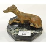 A bronze model of a whippet, mounted on an octagonal marble base,