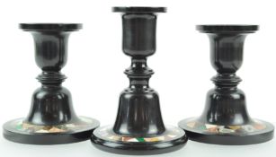 A pair of Victorian Derbyshire Ashford marble candlesticks, with geometric pietra dura bands,