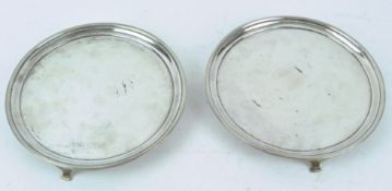 A pair of silver salvers, of plain rounded form with reeded edges and on plain feet, Edinburgh 1798,