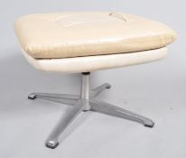 A 1960's rectangular retro footstool on aluminum swivel base,