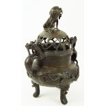 A 19th century Japanese bronze Koro and cover,
