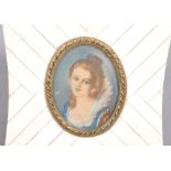 An oval miniature portrait of a bust-length lady in historical revival dress,