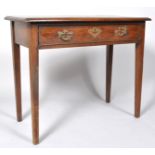 A George III oak side table with one frieze drawer, on square tapering legs, 73cm high x 87.